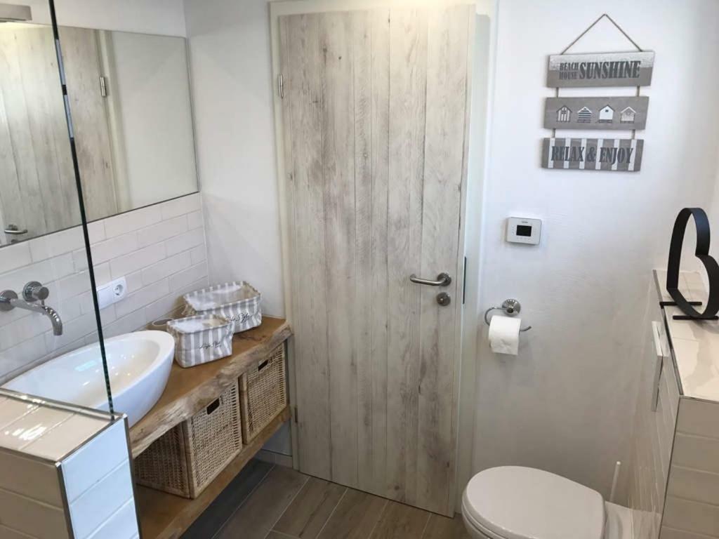 Ferienhaus Wattwurm Rysum Екстер'єр фото